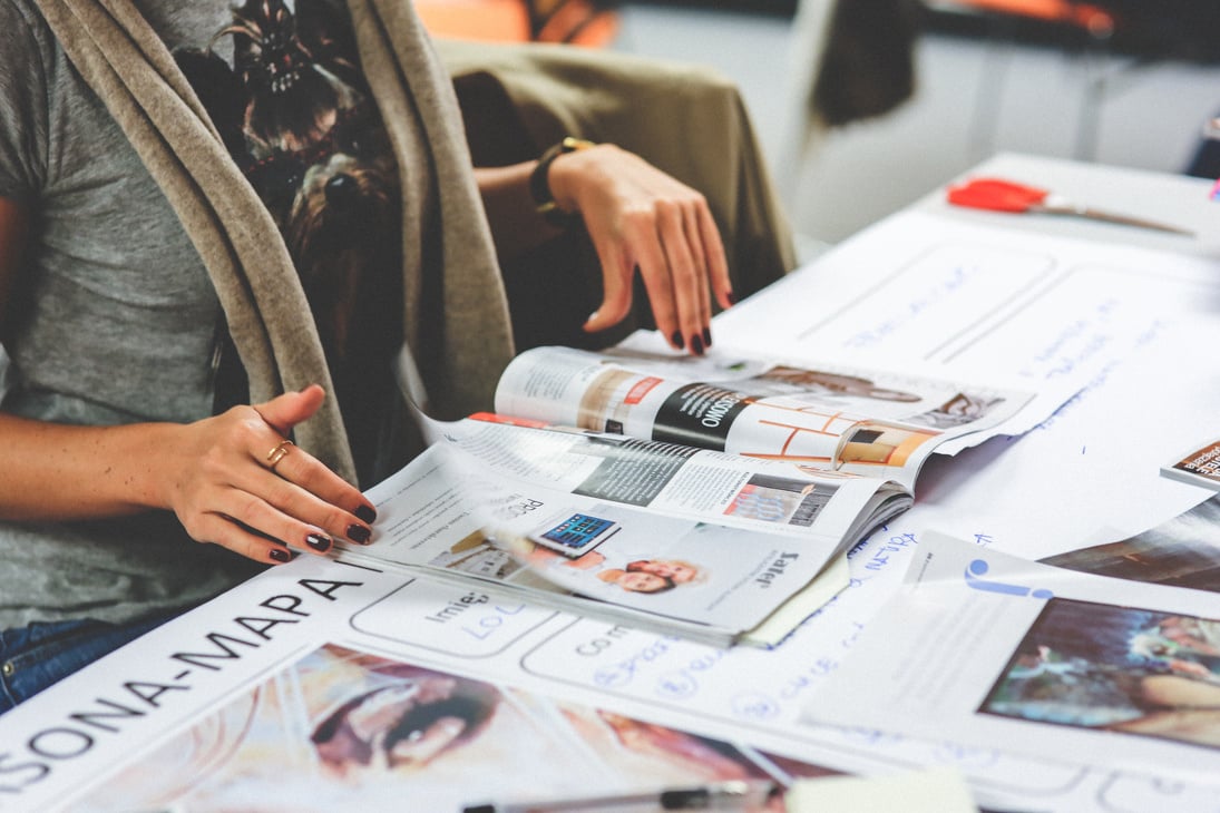 Female Designer Looking at a Magazine